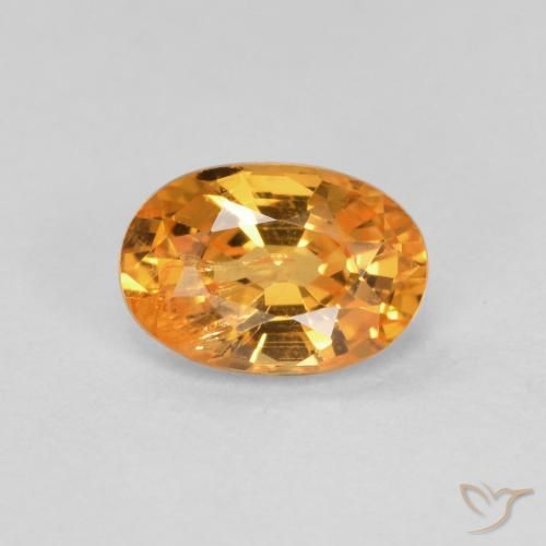 0.60ct Natural Naranja albaricoque Hilo de espesartita, Ovalada, VS-SI