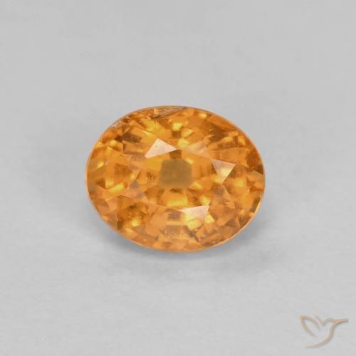 0.60ct Natural Naranja albaricoque Hilo de espesartita, Ovalada, VS-SI
