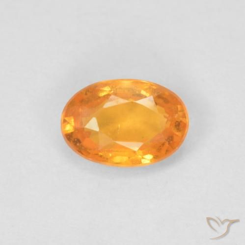 0.64ct Natural Naranja intenso Hilo de espesartita, Ovalada, VS