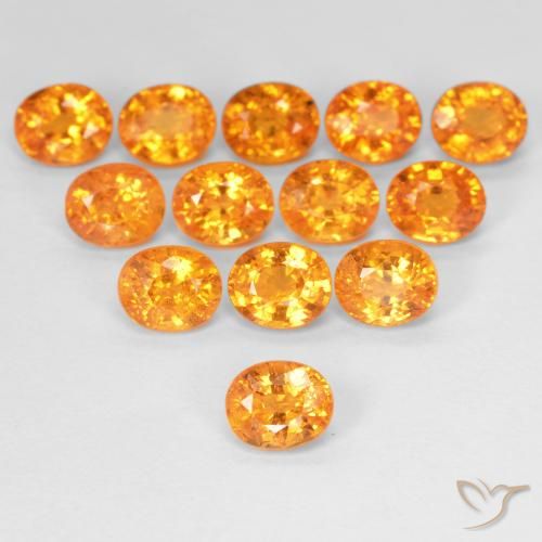 0.63ct Natural Naranja intenso Hilo de espesartita, Ovalada, VS