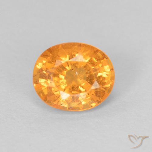 0.70ct Natural Naranja miel Hilo de espesartita, Ovalada, VS-SI