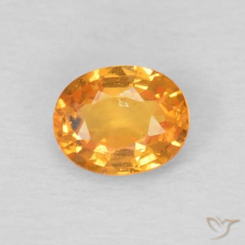 0.44ct Natural Ámbar naranja Hilo de espesartita, Ovalada, VS