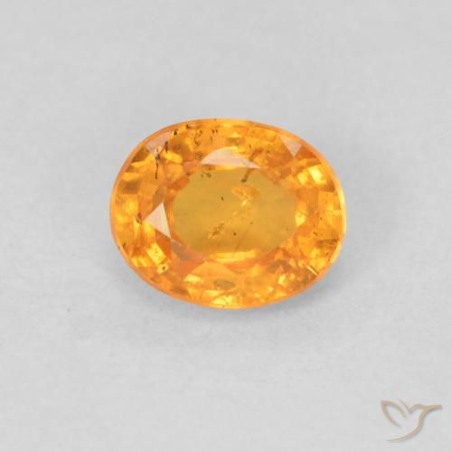 0.56ct Natural Naranja miel Hilo de espesartita, Ovalada, VS-SI