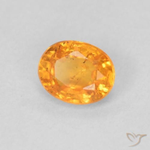 Hilo de espesartita Naranja miel natural de 0.56 ct, Ovalada, VS-SI