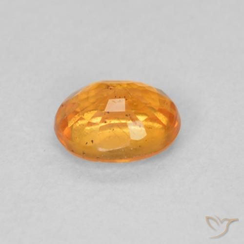 Hilo de espesartita Naranja miel natural de 0.56 ct, Ovalada, VS-SI