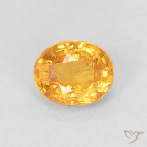 0.57ct Natural Naranja medio Hilo de espesartita, Ovalada, VS