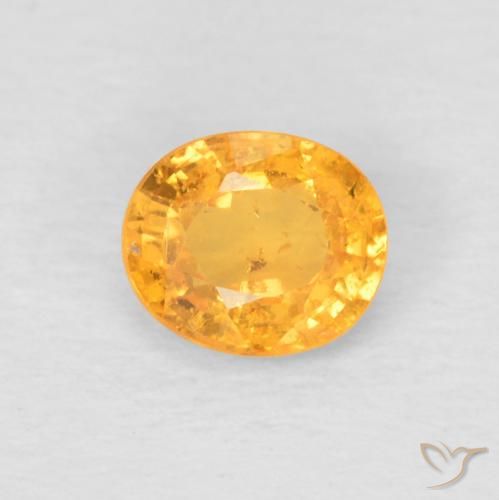 0.52ct Natural Dorado naranja oscuro Hilo de espesartita, Ovalada, VS