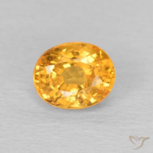 0.58ct Natural Dorado naranja oscuro Hilo de espesartita, Ovalada, VS