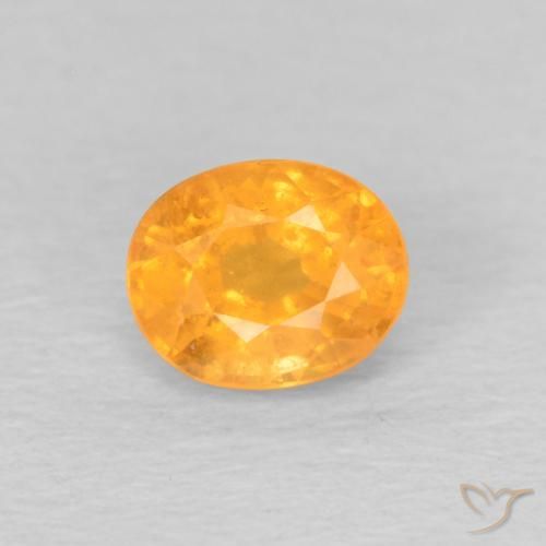 0.61ct Natural Dorado naranja Hilo de espesartita, Ovalada, VS