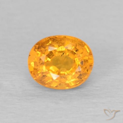 0.64ct Natural Naranja miel Hilo de espesartita, Ovalada, VS