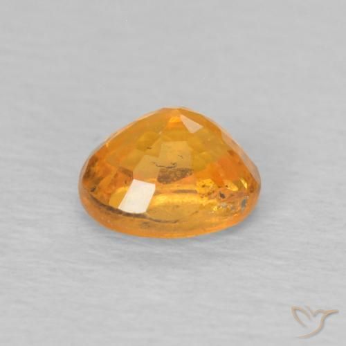 Hilo de espesartita Naranja miel natural de 0.64 ct, Ovalada, VS