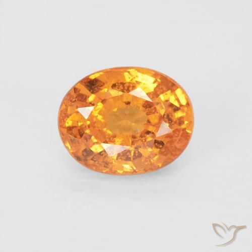 0.58ct Natural Naranja medio Hilo de espesartita, Ovalada, VS