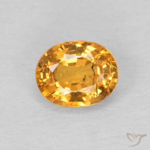 0.56ct Natural Naranja miel Hilo de espesartita, Ovalada, VS-SI