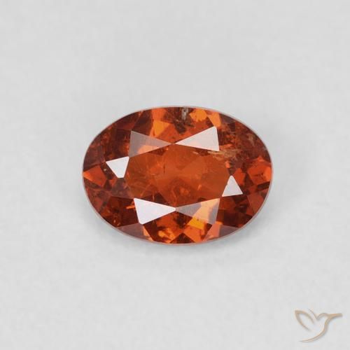 0.70ct Natural Naranja oscuro Hilo de espesartita, Ovalada, SI-I1