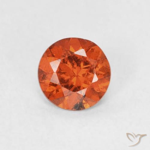 0.51ct Natural Ámbar naranja Hilo de espesartita, Redondo, SI