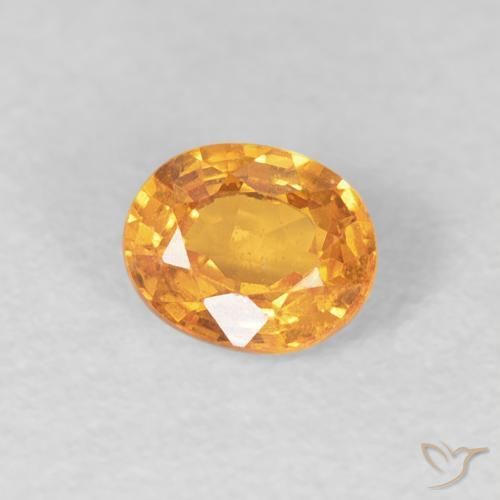 Hilo de espesartita Naranja miel natural de 0.56 ct, Ovalada, VS