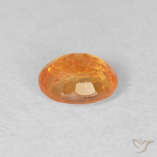 Hilo de espesartita Naranja miel natural de 0.56 ct, Ovalada, VS