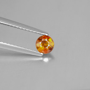 Esfalrita Naranja rojizo natural de 0.46 ct, Corte Redondo, VS