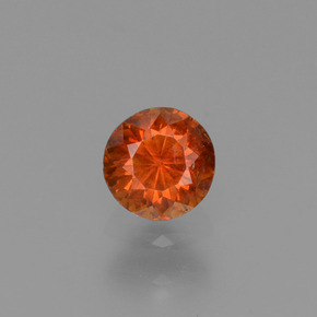 Esfalrita Naranja rojizo natural de 0.42 ct, Corte Redondo, VS
