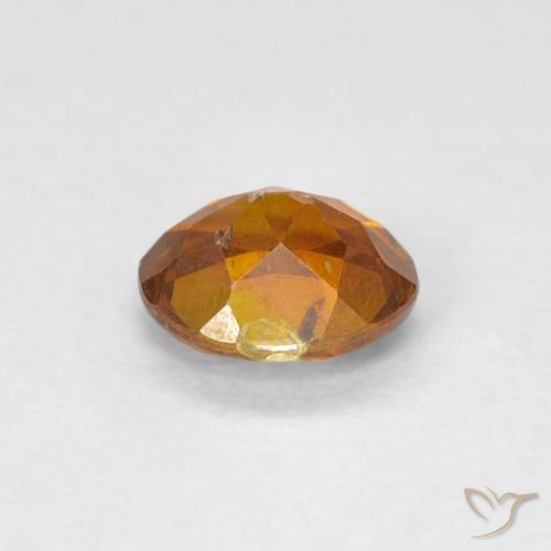 Esfalrita Naranja marrón natural de 0.78 ct, Ovalada, VS-SI