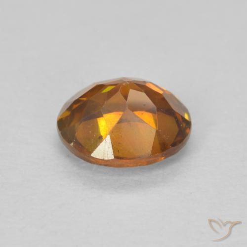 Esfalrita Naranja terroso natural de 0.77 ct, Ovalada, SI-I1