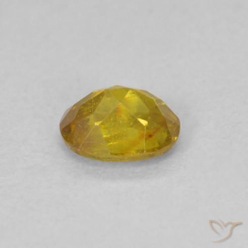 Esfalrita Amarillo amarronado natural de 0.52 ct, Ovalada, VS-SI