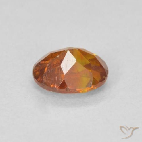 Esfalrita Naranja marrón natural de 0.68 ct, Ovalada, SI