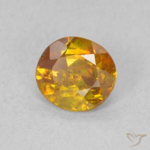 Esfalrita Naranja terroso natural de 0.65 ct, Ovalada, SI
