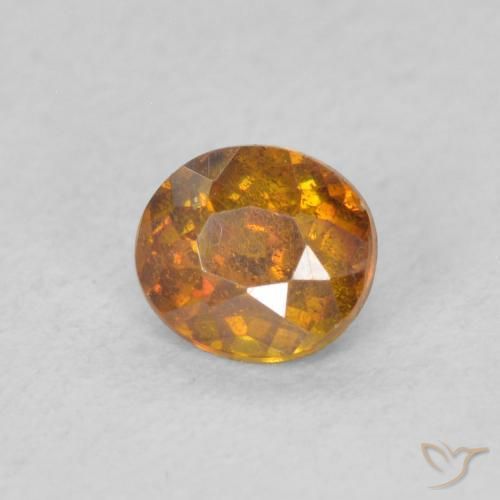 Esfalrita Naranja terroso natural de 0.52 ct, Ovalada, SI