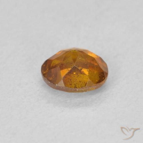 Esfalrita Naranja terroso natural de 0.52 ct, Ovalada, SI