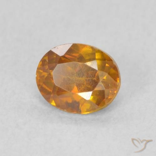 Esfalrita Naranja oscuro natural de 0.56 ct, Ovalada, SI