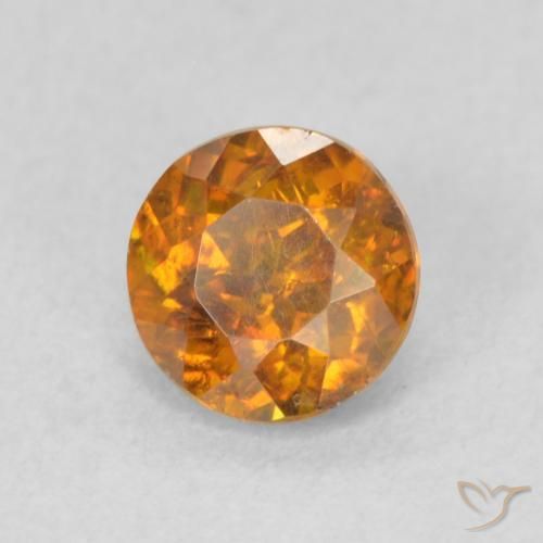 Esfalrita Naranja terroso natural de 0.77 ct, Redondo, SI