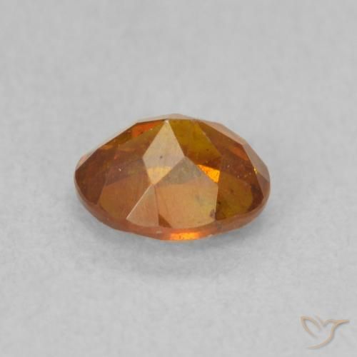 Esfalrita Naranja oscuro natural de 0.72 ct, Ovalada, SI