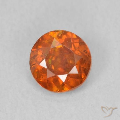 0.56ct Natural Naranja medio Esfalrita, Redondo, SI