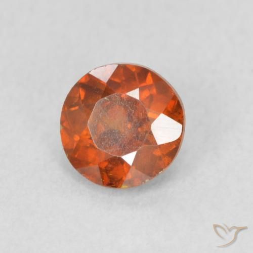 Esfalrita Naranja rojizo natural de 0.68 ct, Redondo, VS-SI