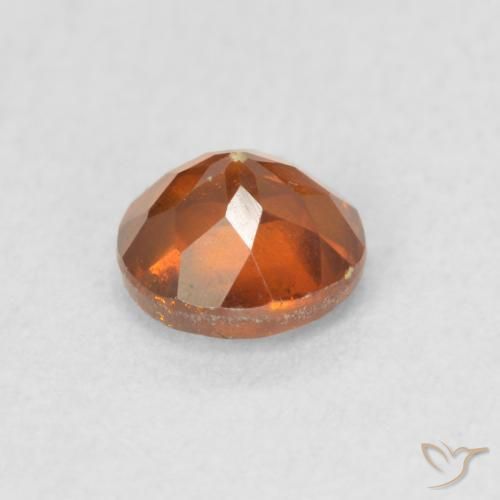 Esfalrita Naranja rojizo natural de 0.68 ct, Redondo, VS-SI