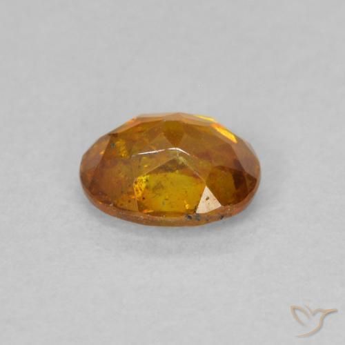 Esfalrita Naranja terroso natural de 0.63 ct, Ovalada, SI