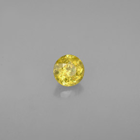 Esfena Dorado verdoso natural de 0.39 ct, Corte Redondo, VS
