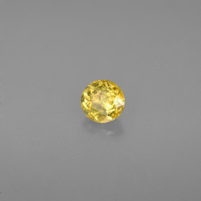 Esfena Dorado verdoso natural de 0.34 ct, Corte Redondo, VS