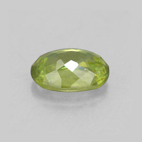 Esfena verde natural de 0,96 ct, corte óvalo, VS