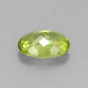 Esfena verde natural de 0,88 ct, corte óvalo, VS