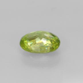 Esfena verde natural de 0,85 ct, corte óvalo, VS