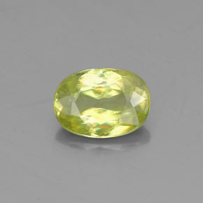 Esfena verde natural de 0,83 ct, corte óvalo, VS