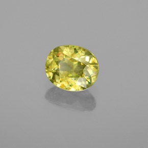 Esfena Verde dorado natural de 0.83 ct, Corte Óvalo, VS