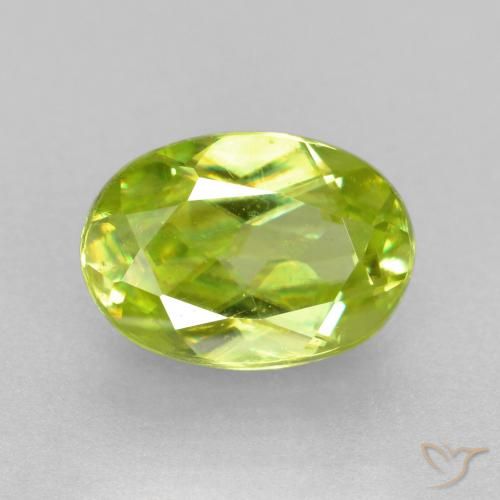 0.77ct Natural Verde claro esfena, Ovalada, VS