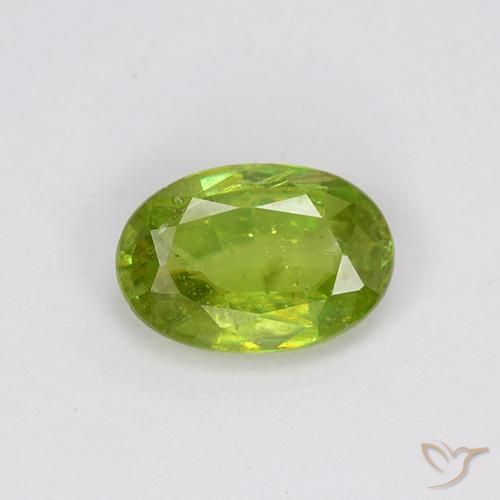 0.73ct Natural Verde claro esfena, Ovalada, VS-SI