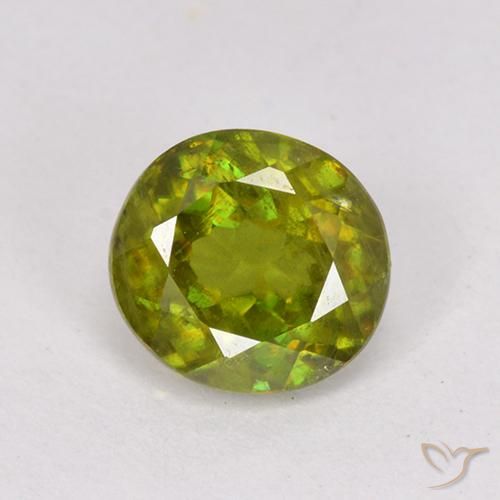 0.95ct Natural Verde bosque cálido esfena, Ovalada, VS-SI