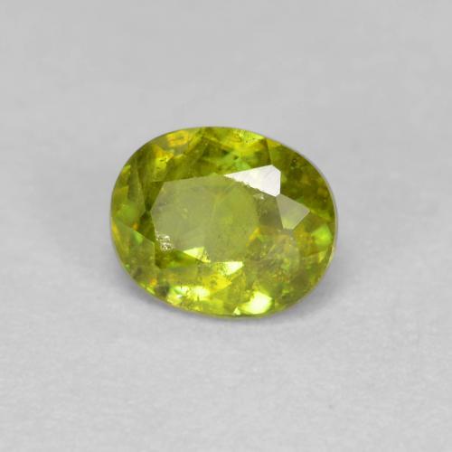 Esfena Verde medio natural de 0.54 ct, Corte Óvalo, VS