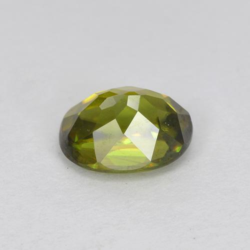 Esfena Verde bosque natural de 0.73 ct, Corte Óvalo, VVS