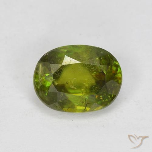 0.83ct Natural Verde terroso cálido esfena, Ovalada, VS-SI